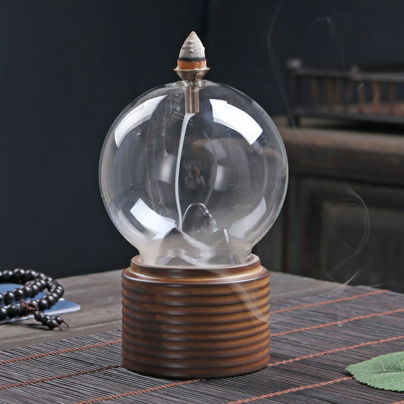 Mystic Globe Back Flow Incense Burner: A Serene Dance of Smoke & Silhouettes