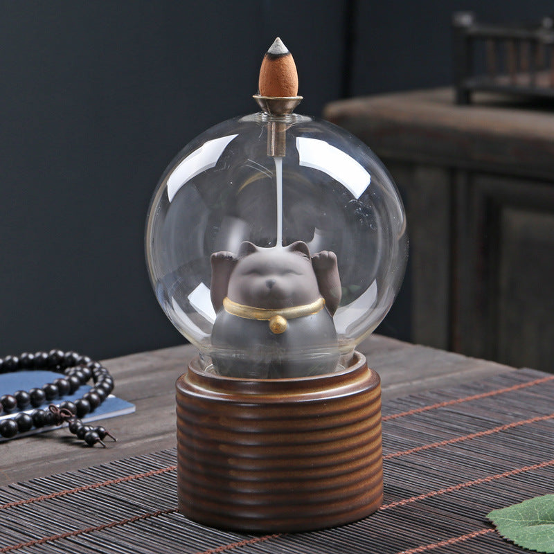 Mystic Globe Back Flow Incense Burner: A Serene Dance of Smoke & Silhouettes