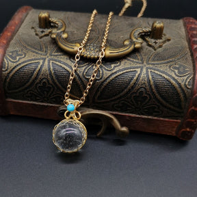 Enchanted Orb: Woven Crystal Ball Pendant on Versatile Necklace