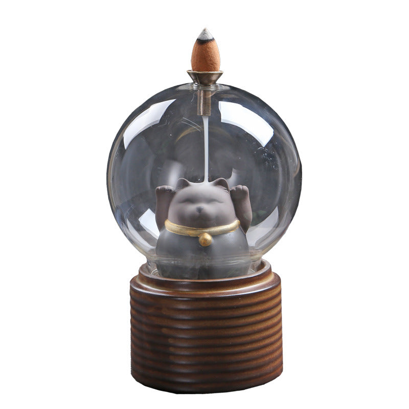 Mystic Globe Back Flow Incense Burner: A Serene Dance of Smoke & Silhouettes