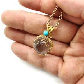 Enchanted Orb: Woven Crystal Ball Pendant on Versatile Necklace