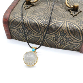 Enchanted Orb: Woven Crystal Ball Pendant on Versatile Necklace